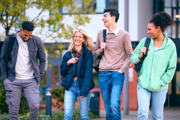 Group of students walking together on campus.